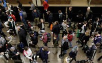 KIRO Radio's Josh Kerns reports he stood in a security line at Sea-Tac Airport for almost an hour Thursday morning. (AP)