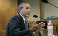 FILE - In this July 29, 2015 file photo, Texas Attorney General Ken Paxton speaks during a hearing in Austin, Texas. Federal securities regulators have filed civil fraud charges against  Paxton, Monday, April 11, 2016, over recruiting investors to a high-tech startup before becoming the state's top prosecutor. (AP Photo/Eric Gay)