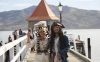 Bride Marianna Fenn and bridegroom Toby Ricketts stand on a jetty in Akaroa harbor, New Zealand, Saturday April 16, 2016. New Zealand hosted the world’s first Pastafarian wedding, conducted by the Church of the Flying Spaghetti Monster. The group, which began in the U.S. as a protest against religion encroaching into public schools, has gained legitimacy in New Zealand, where authorities recently decided it can officiate weddings. (AP Photo/Nick Perry)
