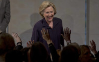 Democratic presidential candidate Hillary Clinton greets members of the audience during a Glassdoor Pay Equality Roundtable, Tuesday, April 12, 2016, in New York. (AP Photo/Mary Altaffer)