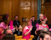 Irish rock star and activist Bono, right, stops to take a photograph with members of the activist group "CodePink" as he arrives on Capitol Hill in Washington, Tuesday, April 12, 2016, to testify before the Senate State, Foreign Operations, and Related Programs subcommittee hearing on the causes and consequences of violent extremists, and the role of foreign assistance. (AP Photo/Andrew Harnik)