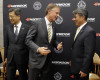 Tennessee Gov. Bill Haslam, center, talks with Hee Se Ahn, president of Hankook Tire America Corp., Wednesday, April 13, 2016, in Nashville, Tenn., after it was announced that Hankook is relocating its North American headquarters from New Jersey to Tennessee. At left is S. H. John Sun, vice chairman and CEO of Hankook Tire. (AP Photo/Mark Humphrey)