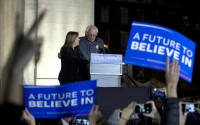Democratic presidential candidate, Sen. Bernie Sanders, I-Vt., and his wife Jane appear on stage during a campaign rally at Washington Square, Wednesday, April 13, 2016 in New York. (AP Photo/Mary Altaffer)