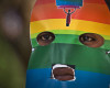 FILE - In this Monday, Feb. 10, 2014 file photo, Kenyan gays and lesbians and others supporting their cause wear masks to preserve their anonymity as they stage a rare protest, against Uganda's tough stance against homosexuality, outside the Uganda High Commission in Nairobi, Kenya. A Kenyan rights group said Friday, April 15, 2016 that it is going to court to decriminalize gay sexual relations between consenting adults in Kenya, which currently carry a maximum penalty of 14 years’ imprisonment. (AP Photo/Ben Curtis, File)