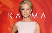 FILe - In this April 8, 2016 file photo, Fox News anchor Megyn Kelly attends the 2016 Variety's Power of Women: New York in New York. Donald Trump met with Fox News Channel anchor Megyn Kelly on Wednesday, April 13, 2016, who he has been bad-mouthing on social media since he was angered by a question she asked him last summer. Fox says the meeting, in New York's Trump Tower, will be discussed on Kelly's Fox show Wednesday night. (Photo by Evan Agostini/Invision/AP, File)