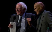 Democratic presidential candidate, Sen. Bernie Sanders, I-Vt., is joined on stage by Harry Belafonte as he speaks at a campaign event at the Apollo Theatre, Saturday, April 9, 2016, in the Harlem neighborhood of Manhattan. (AP Photo/Mary Altaffer)