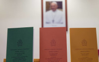 Copies of the post-synodal apostolic exhortation ' Amoris Laetitia ' (The Joy of Love) document are on display prior to the start of a press conference, at the Vatican, Friday, April 8, 2016. Pope Francis has insisted that individual conscience be the guiding principle for Catholics negotiating the complexities of sex, marriage and family life in a major document released Friday that repudiates the centrality of black and white rules for the faithful. In the 256-page document "The Joy of Love," released Friday, Francis makes no change in church doctrine. (AP Photo/Andrew Medichini)