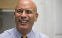 In this photo taken April 6, 2016, Tim Canova smiles as he speaks during an interview at his campaign headquarters in Hollywood, Fla. When Canova, a law school professor and political activist, pressed his south Florida congresswoman to vote against fast-track trade legislation last summer, he said he got the brush off from her staff. Angered over the experience and what he viewed as a lawmaker with a less than progressive voting record, the constituent turned the political tables on one of the Democratic Party’s most powerful leaders, Rep. Debbie Wasserman Schultz. He decided to run against her.  (AP Photo/Wilfredo Lee)