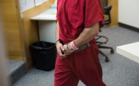 John Charlton appears in court at the King County Jail Courtroom in Seattle on Tuesday, April 12, 2016. Charlton was arrested for investigation of homicide after police said human remains were found over the weekend in a homeowner's recycling bin. (Grant Hindsley/seattlepi.com via AP) MAGS OUT; NO SALES; SEATTLE TIMES OUT; TV OUT; MANDATORY CREDIT