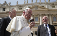 Pope Francis drinks from a mate gourd at the end of his weekly general audience, in St. Peter's Square at the Vatican, Wednesday, April 6, 2016. (AP Photo/Andrew Medichini)