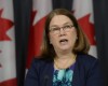 Canada Health Minister Jane Philpott speaks at a news conference in Ottawa on Thursday, April 14, 2016. Canada has introduced a new assisted suicide law that will only apply to Canadians and residents, meaning Americans won't be able to travel to Canada to die. Visitors will be excluded under the proposed law announced Thursday, precluding the prospect of suicide tourism. Canadian government officials said to take advantage of the law the person would have to be eligible for health services in Canada.  (Adrian Wyld /The Canadian Press via AP) MANDATORY CREDIT