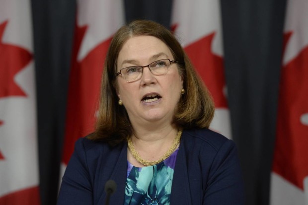 Canada Health Minister Jane Philpott speaks at a news conference in Ottawa on Thursday, April 14, 2016. Canada has introduced a new assisted suicide law that will only apply to Canadians and residents, meaning Americans won't be able to travel to Canada to die. Visitors will be excluded under the proposed law announced Thursday, precluding the prospect of suicide tourism. Canadian government officials said to take advantage of the law the person would have to be eligible for health services in Canada.  (Adrian Wyld /The Canadian Press via AP) MANDATORY CREDIT