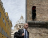 Italian journalist Gianluigi Nuzzi leaves  the Vatican from the Perugino gate, Wednesday, April 13, 2016. Two Italian journalists who wrote books detailing Vatican mismanagement face trial in a Vatican courtroom along with three people accused of leaking them the information in a case that has drawn scorn from media watchdogs. (AP Photo/Alessandra Tarantino)