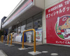 In this Sunday, April 10, 2016 photo, “Carp Boya (boy),” a mascot character for the homegrown baseball club, Hiroshima Toyo Carp, is on display in a poster announcing the sale of official goods at a convenience store near the team’s home stadium in Hiroshima, western Japan. The homegrown baseball club is the only team not owned by a big corporation in Japan’s professional baseball, comprised of 12 teams divided between the Pacific and the Central Leagues. This year’s two-day Group of Seven foreign ministers’ meeting started here Sunday. (AP Photo/Mari Yamaguchi)