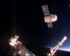 In this frame taken from video from NASA TV, the SpaceX Dragon cargo ship approaches the International Space Station, Sunday April 10, 2016. A SpaceX Dragon cargo ship arrived at the International Space Station on Sunday, two days after launching from Cape Canaveral, Florida. Station astronauts used a big robot arm to capture the Dragon, orbiting 260 miles above Earth. (NASA TV via AP)