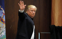 Republican presidential candidate Donald Trump waves leaving the stage after speaking to the New York Republican State Committee Annual Gala, Thursday, April 14, 2016, in New York. (AP Photo/Kathy Willens)