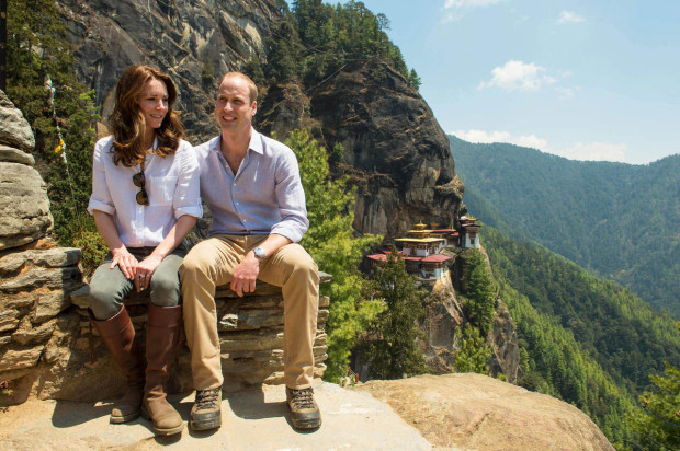 Britain's Prince William and Kate Duchess of Cambridge pose for photo during their hike to the Tiger's Nest Monastery, near Paro, Bhutan, Friday April 15, 2016, during day six of the Royal tour to India and Bhutan. (Joe Giddens/PA via AP) UNITED KINGDOM OUT