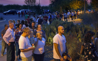 FILE - In this March 22, 2016, file photo, people wait in line to vote in a primary election in Chandler, Ariz. Democrats and Republicans alike in the state’s largest county that’s home to Phoenix are still incredulous over election officials’ decision to operate 60 polling sites on March 22, down from the normal 200. (David Kadlubowski/The Arizona Republic via AP, File)  MARICOPA COUNTY OUT; MAGS OUT; NO SALES; MANDATORY CREDIT