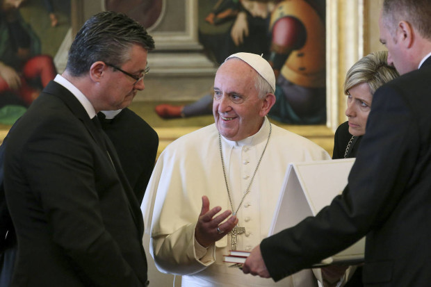 Pope Francis speaks with Croatian Prime Minister Tihomir Oreskovic, left, and his wife Sanja Dujmovic, right, on the occasion of their private audience, at the Vatican, Thursday, April 7, 2016. (Alessandro Di Meo/Pool Photo via AP)