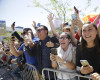 Supporters in the overflow area cheer as they watch Democratic presidential candidate Hillary Clinton walk toward them during a campaign event at the Los Angeles Southwest College on Saturday, April 16, 2016, in Los Angeles. (AP Photo/Jae C. Hong)