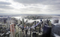 FILE - This May 20, 2015, file photo, shows New York's Financial District, foreground, the Brooklyn Bridge and East River, center, and in the distance Brooklyn as seen from the observatory at One World Trade Center. On Friday, April 15, 2016, the Federal Reserve of New York releases its April survey of manufacturers in the state. (AP Photo/Mark Lennihan, File)