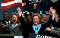 FILE - In this Nov. 6, 2000 file photo,  U.S. Senate candidate then first lady Hillary Clinton and her daughter Chelsea react at the end of a rally at the Albany, N.Y., City Hall. (AP Photo/ Jim McKnight, File)