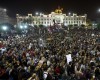 In this Tuesday, April 5, 2016 photo, demonstrators protest presidential candidate Keiko Fujimori and against the 1992 coup by her father, former President Alberto Fujimori, in downtown Lima, Peru. Keiko Fujimori is the front running candidate in Peru's upcoming April 10 election. (AP Photo/Rodrigo Abd)