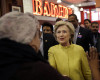 Democratic presidential candidate Hillary Clinton talks to customers at Junior's restaurant in the Brooklyn borough of New York, Saturday, April 9, 2016. (AP Photo/Seth Wenig)