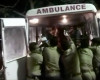 In this image made from video, officials put an injured person into an ambulance following a fire at a temple in Kollam, in the southern Indian state of Kerala, early Sunday, April 10, 2016. A number of people were killed and many more injured in a massive fire that broke out in a temple caused by fireworks that had been stored in the temple in preparation for the Hindu new year festival Vishu, according to an official. (Asianet News via AP Video) INDIA OUT