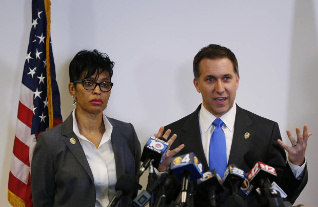 Palm Beach County, Fla. state attorney Dave Aronberg, right, accompanied by assistant state attorney Adrienne Ellis, speaks during a news conference in West Palm Beach, Fla., Thursday, April 14, 2016, where it was announced Donald Trump’s campaign manager Corey Lewandowski won’t be prosecuted for battery after briefly grabbing a female reporter’s arm at a campaign event.   (AP Photo/Wilfredo Lee)