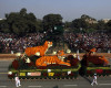 FILE - In this Wednesday, Jan. 26, 2011, file photo, a floral tableau by Central Public Works Department depicts the theme "Save Tigers" during the Republic Day parade in New Delhi, India. Countries with wild tiger populations have agreed to do more to protect tiger habitats that are shrinking drastically because of deforestation and urban sprawl, conservationists said Friday, April 15, 2016. Representatives from the 13 Asian countries with tigers, meeting this week in New Delhi, issued a resolution acknowledging that the forests in which tigers live are inherently valuable themselves and worthy of protection.(AP Photo/Manish Swarup, File)