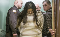 FILE - In this Monday, March 30, 2015 file photo, Purvi Patel is taken into custody after being sentenced to 20 years in prison for feticide and neglect of a dependent, at the St. Joseph County Courthouse in South Bend, Ind. Lynn Paltrow, executive director of National Advocates for Pregnant Women, said it marked the first time a woman in the U.S. has been convicted and sentenced for attempting to end her pregnancy. (Robert Franklin/South Bend Tribune via AP)