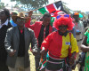 Kenyan people dance in Afraha Stadium, Nakuru, Kenya, as they attend a thanks giving rally, Saturday, April 16, 2016. Kenyan President Uhuru Kenyatta and five others who had been charged with crimes against humanity at the International Criminal Court held a rally attended by thousands to celebrate the withdrawal of the charges against them. The rally has been opposed by opposition leader Raila Odinga and some members of civic organizations who say it does not respect the suffering of the victims of violence following a disputed presidential election late 2007. (AP Photo/Kevin Midigo)