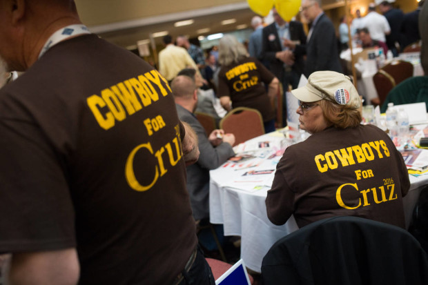 Supporters of Republican presidential candidate Sen. Ted Cruz wear "Cowboys for Cruz" t-shirts in the University of Wyoming colors during the Wyoming GOP Convention on Saturday, April 16, 2016, at the Parkway Plaza Hotel and Convention Centre in Casper, Wyo. (Jenna VonHofe /The Casper Star-Tribune via AP) MANDATORY CREDIT