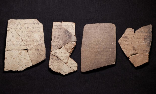 Letters inscribed on pottery, known as ostracons, which were unearthed in an excavation of a fort in Arad, Israel, and dated to about 600 B.C. shortly before Nebuchadnezzar’s destruction of Jerusalem, are seen in Israel Museum in Jerusalem Tuesday, April 12, 2016.  A Tel Aviv University team determined that this famous hoard of ancient Hebrew inscriptions was written by at least six different authors. Although the inscriptions are not from the Bible, their discovery suggests there was widespread literacy in ancient Judah at the time that would support the composition of biblical works.  (AP Photo/Dan Balilty)
