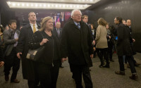 Democratic presidential candidate, Sen. Bernie Sanders, I-Vt., and wife Jane walk in Times Square on their way to see the Broadway show Hamilton, Friday, April 8, 2016, in New York. (AP Photo/Mary Altaffer)