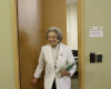 Patient relations representative Elena Griffing smiles while interviewed at Sutter Health Alta Bates Summit Medical Center in Berkeley, Calif., Monday, April 11, 2016. Griffing, 90, has started her 70th year working for the same San Francisco Bay Area hospital. (AP Photo/Jeff Chiu)