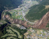 A landslide is seen after the earthquake in Minamiaso, Kumamoto prefecture, southern Japan Saturday, April 16, 2016. A powerful earthquake struck southern Japan early Saturday, barely 24 hours after a smaller quake hit the same region. (Kyodo News via AP) JAPAN OUT, MANDATORY CREDIT
