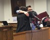 Judge Cheryl Carey hugs a graduate of the King County drug diversion court program. (Josh Kerns)