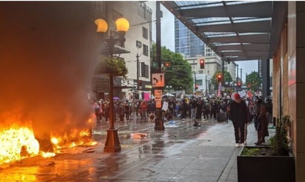 A peaceful protest in Seattle on Saturday gave way to fires and destruction. (KIRO Radio, Hanna Sco...