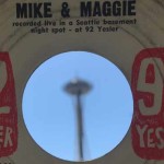 Mike & Maggie’s 1962 recording of Chris Todd’s “Wasn’t That A Mighty Day When The Needle Hit The Ground,” with the target of its satire visible in the distance through the center hole. (Feliks Banel)