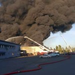 Smoke from a third-alarm fire at an Everett recycling center was visible for miles Saturday evening. (Everett Fire)