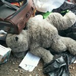 A teddy bear among trash in Seattle's Jungle. Outreach officials recently helped a mother and a 6-year-old child leave the homeless encampment. (City of Seattle)