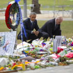 
              President Barack Obama and Vice President Joe Biden visit a memorial to the victims of the Pulse nightclub shooting, Thursday, June 16, 2016 in Orlando, Fla. Offering sympathy but no easy answers, Obama came to Orlando to try to console those mourning the deadliest shooting in modern U.S history. (AP Photo/Pablo Martinez Monsivais)
            