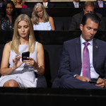 
              Republican Presidential Candidate Donald Trump's children Ivanka Trump and Donald Trump Jr., check on their phones during the second day session of the Republican National Convention in Cleveland, Tuesday, July 19, 2016. (AP Photo/Carolyn Kaster)
            