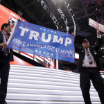 
              Trump supporters cheer during first day of the Republican National Convention in Cleveland, Monday, July 18, 2016. (AP Photo/Matt Rourke)
            