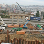 A sheet piling wall marks the north end of the final bridge pier built for the Pacific Avenue overpass. (WSDOT)