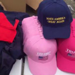 Some of the Trump merchandise available at the Trump rally in Everett. (Josh Kerns/KIRO Radio)