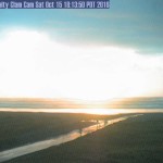 A sunset on the coast after a passing storm on Saturday. (Pacific Realty Cam)