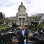 
              Seattle Seahawks NFL football wide receiver Doug Baldwin talks to reporters Monday, Nov. 21, 2016, after he testified at a joint legislative task force on the use of deadly force in community policing at the Capitol in Olympia, Wash. Baldwin, whose father was a police officer, has been outspoken on the issues of police training, racial profiling, and the use of force by law enforcement officers. (AP Photo/Ted S. Warren)
            